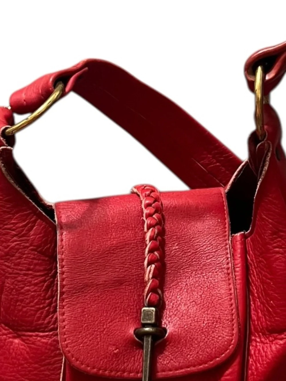 Vintage Handmade Red leather hobo-style shoulder bag featuring a woven strap